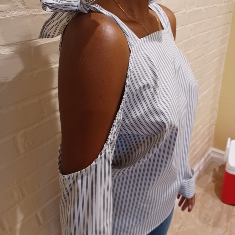 Pinstriped long sleeve, open shoulder shirt